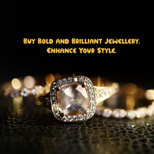 Close-up of a sparkling gold and diamond ring with a blurred background of gold jewelry.