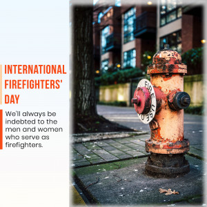 A rusty fire hydrant with text commemorating International Firefighters' Day.