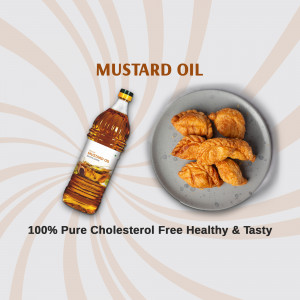 Bottle of mustard oil with fried snacks on a plate