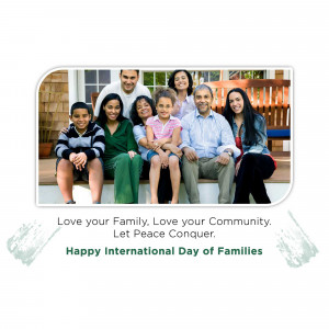A family of seven sitting on steps with a message about love and peace.