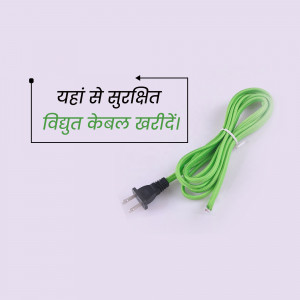 Green electrical cable with a black plug