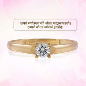 Close-up of a gold ring with a single diamond stone
