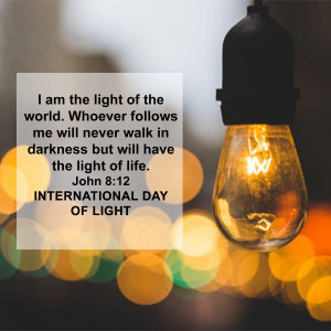 Image of a glowing lightbulb with text 'I am the light of the world. Whoever follows me will never walk in darkness but will have the light of life. John 8:12' and 'International Day of Light'