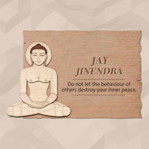 Wooden carving of Lord Jinendra with a motivational quote.
