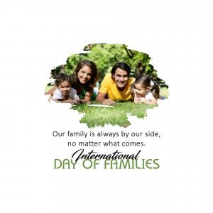 A happy family lying on grass with text celebrating International Day of Families.