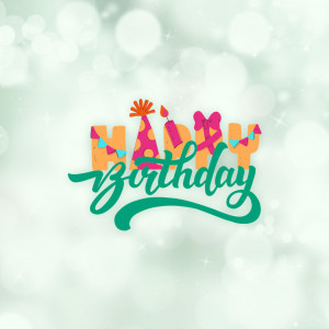 Colorful 'Happy Birthday' text with candles and decorations
