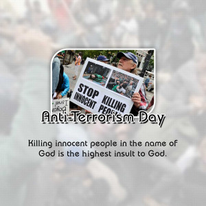 People protesting against terrorism with signs reading 'Stop Killing Innocent People'