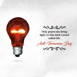 Lightbulb with a mushroom cloud inside, symbolizing Anti-Terrorism Day and the need for peace.