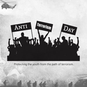 Silhouette of people holding signs for Anti-Terrorism Day with a helicopter in the background.
