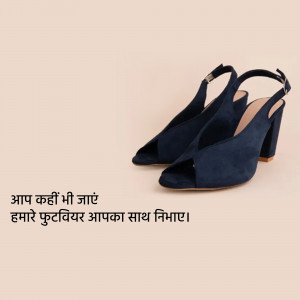 Pair of navy blue suede heels with an open toe and block heel, displayed with text in Hindi.