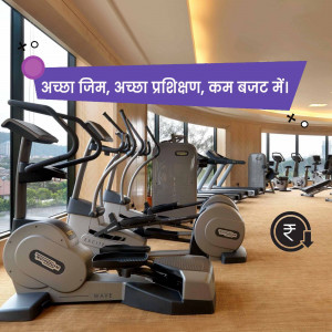 Modern gym interior with exercise machines and a view.