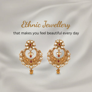 Pair of gold earrings with red and white stone detailing