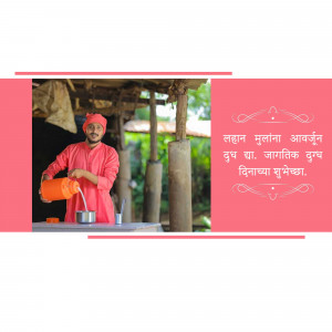 A smiling tea vendor in a pink outfit stands in front of his stall.