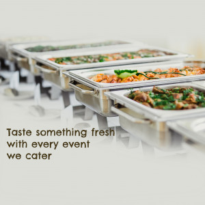 A long line of silver catering trays filled with various food dishes, arranged for a buffet.