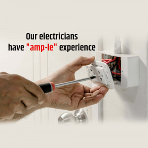 Electrician installing an electrical outlet