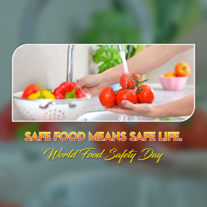 Hands washing fresh tomatoes under running water in a kitchen sink, promoting food safety.