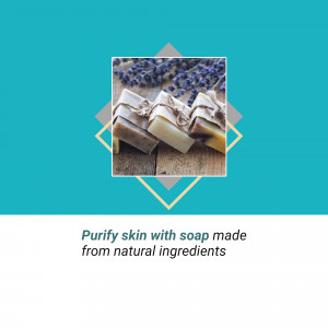 Close-up of handmade lavender soap bars with lavender flowers