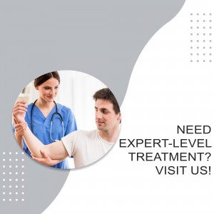 Doctor assisting a male patient with arm exercise