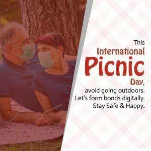 Couple wearing masks on a picnic blanket with text promoting digital connection on International Picnic Day.
