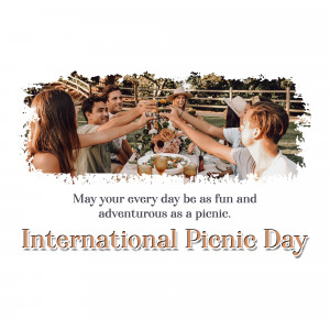 Friends toasting with drinks at a picnic, celebrating International Picnic Day.
