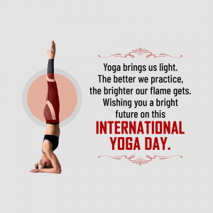 Woman performing a headstand with text celebrating International Yoga Day.