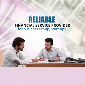 Two businessmen discussing financial documents at a table.