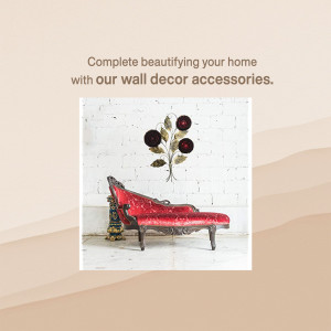 Red couch with floral wall decor against a brick wall