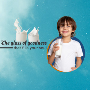 A young boy holding a glass of milk with a splash of milk in the background.