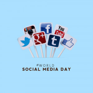 Social media icons on white sticks with 'World Social Media Day' text
