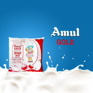 Image of an Amul Gold full cream milk pack with a splash of milk.