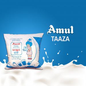 Amul Taaza milk pack with a girl illustration and splash of milk