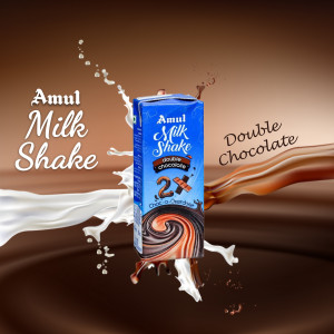Amul Double Chocolate Milk Shake carton with splashing milk and chocolate