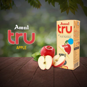 Amul Tru Apple Juice carton with fresh apples