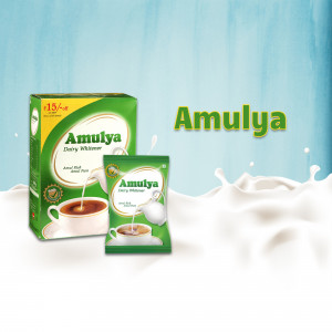 Pack of Amulya Dairy Whitener with a cup of tea