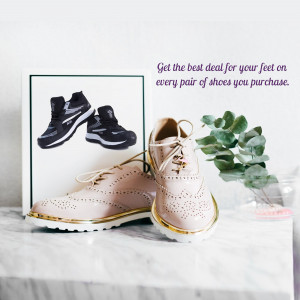 Pair of stylish shoes with a promotional message