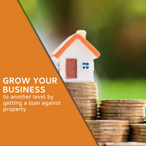 Miniature house on a stack of coins with text promoting business loans.