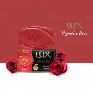 Lux Hypnotic Rose soap bar with roses on a red background