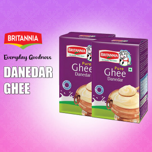 Two packs of Britannia Pure Ghee Danedar displayed against a purple background.