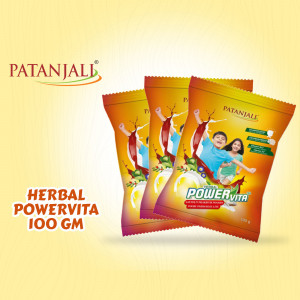 Three Patanjali Powervita 100gm herbal powder sachets against a yellow background.