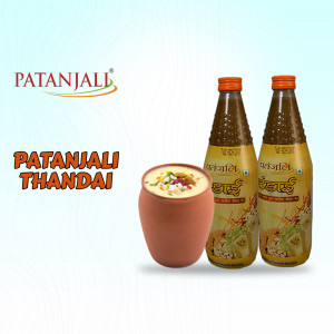 Patanjali Thandai bottles and a glass of Thandai drink