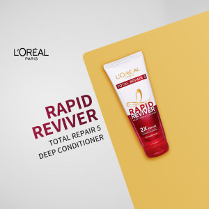 L'Oréal Paris Rapid Reviver Total Repair 5 Deep Conditioner product shot on a yellow background