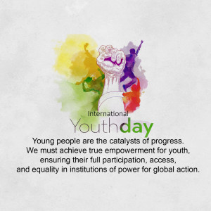 Image depicting a raised fist with silhouettes of young people celebrating, with the text 'International Youth Day' and a message about youth empowerment.