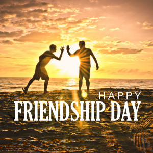 Two friends high-fiving on a beach at sunset with 'Happy Friendship Day' text.