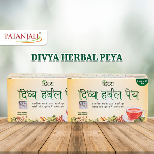 Two boxes of Patanjali Divya Herbal Peya on a wooden surface with a cup of tea.