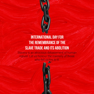 Broken chains against a red background with text commemorating the International Day for the Remembrance of the Slave Trade and its Abolition.