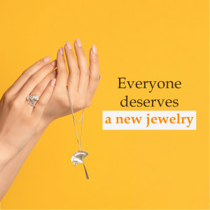 Close-up of hands showcasing a silver necklace and ring against a vibrant yellow background with text 'Everyone deserves a new jewelry'.