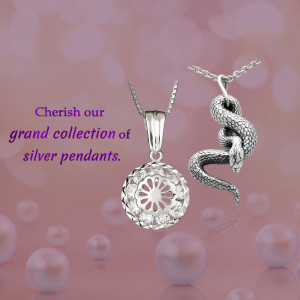 Close-up of a silver pendant shaped like a snake coiled around a floral orb.