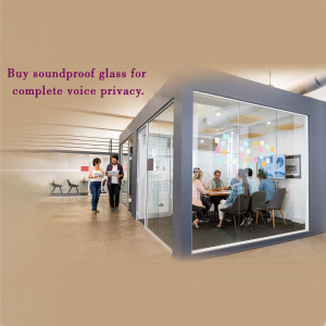 People in a soundproof glass office pod discussing work.