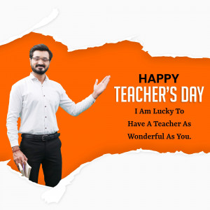 A man gesturing towards text that reads 'Happy Teacher's Day'