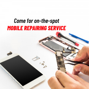 Close-up of a technician repairing a smartphone with tools.